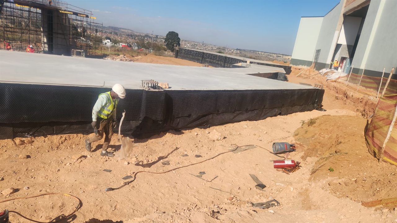 Concrete slab waterproofing